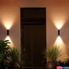 Kép 2/3 - Philips Hue Appear kültéri fekete fali lámpa, lefelé és felfelé világít, White and Color Ambiance, 2x8W, 1200lm, RGBW 2000-6500K, IP44, 1746330P7